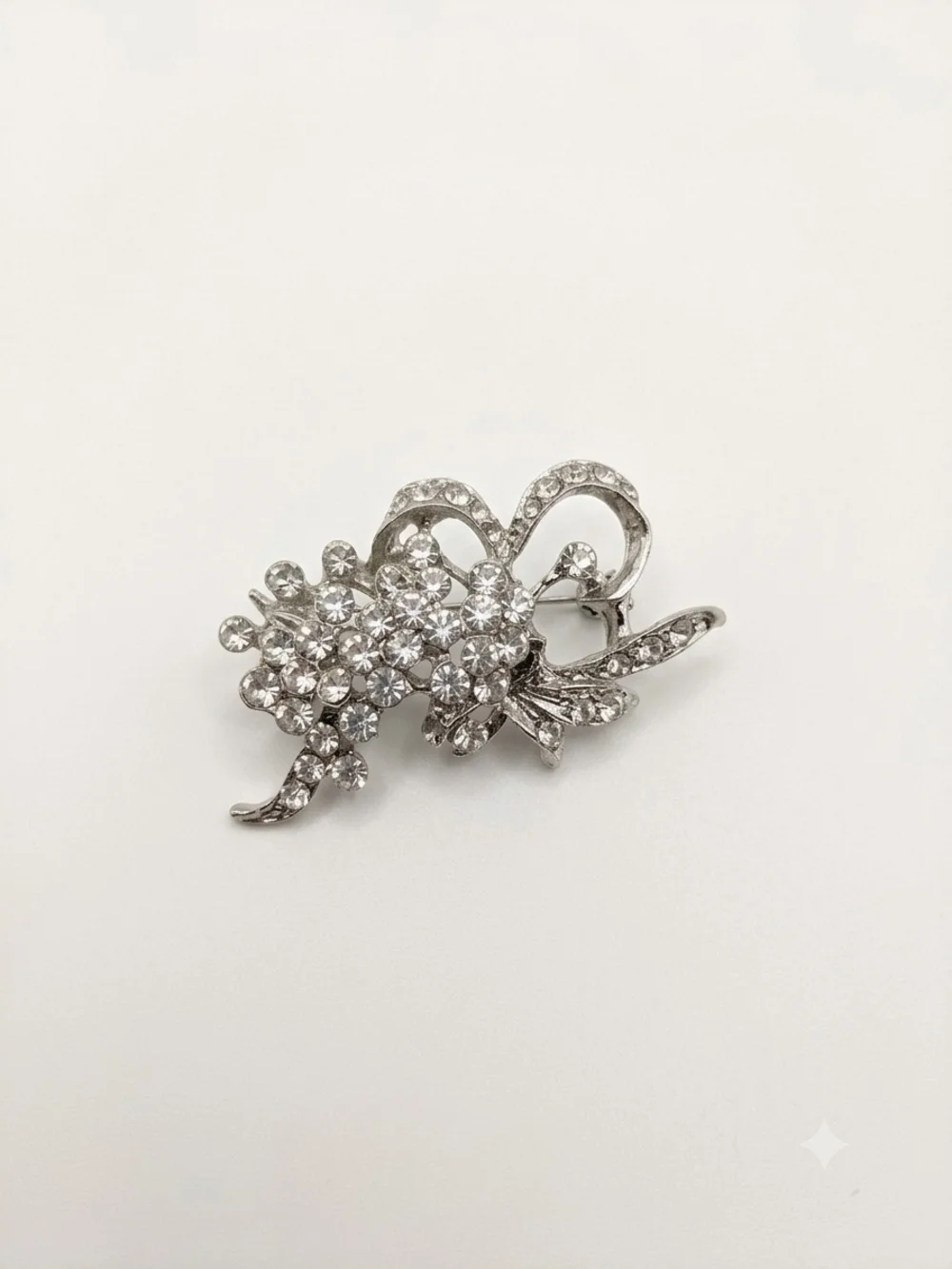 Silver Crystal Floral Bow Brooch - Elegant Sparkling Accent